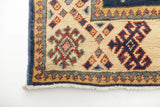 Kazak-Super 64579 Ziegler/Kazak rug by Orientmattor with intricate geometric patterns and vibrant colors on a woven surface.