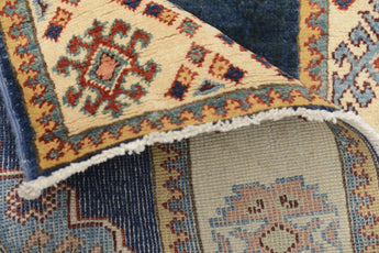 Kazak-Super 64579 Ziegler/Kazak rug by Orientmattor with intricate geometric patterns in warm earthy tones.