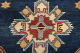 Orientmattor Kazak-Super 64579 Ziegler/Kazak rug with intricate patterns and rich colors, detailed close-up of woven textile.