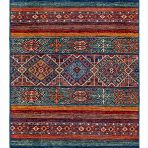 Orientmattor Khorjin 64862 Ziegler/Kazak rug with intricate geometric patterns and rich colors, detailed close-up of woven textile.
