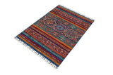 Orientmattor Khorjin 64862 Ziegler/Kazak rug with intricate geometric patterns and rich earthy tones, detailed woven textile.