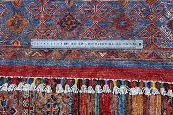 Orientmattor Khorjin 64865 Ziegler/Kazak rug with intricate geometric patterns and vibrant colors, traditional handmade textile.