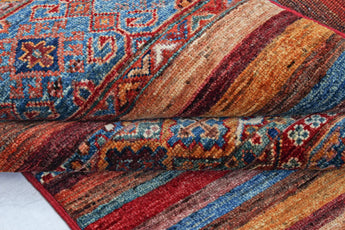 Orientmattor Khorjin 64865 Ziegler/Kazak rug with intricate patterns and rich colors, traditional handmade textile, close-up view.