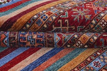 Khorjin 64873 Ziegler/Kazak rug by Orientmattor, featuring intricate geometric patterns in warm earthy tones.