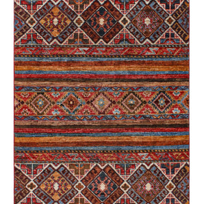 Khorjin 65008 Ziegler/Kazak rug by Orientmattor, featuring traditional geometric patterns in rich colors on a woven textile background.