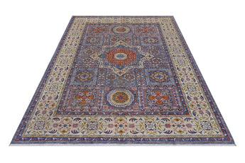 Orientmattor Mamlook 64992 Ziegler/Kazak rug with intricate geometric patterns and warm earthy tones on a woven textile background.