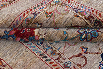 Orientmattor Sultani 64869 Ziegler/Kazak rug featuring intricate patterns and rich colors on a textured background.